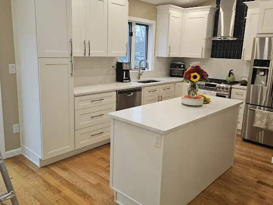 Milford kitchen after remodel with white island